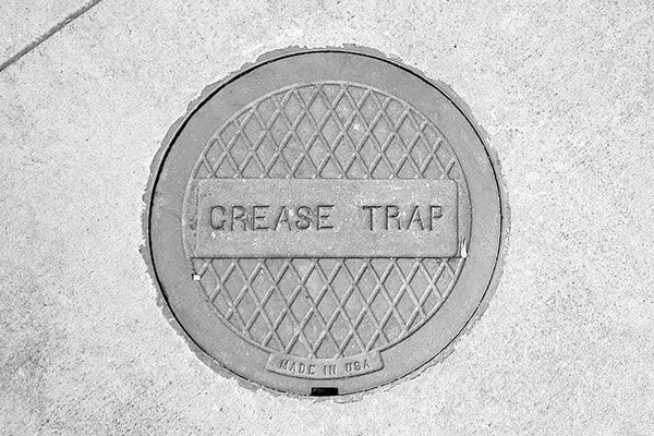 regular grease trap pumping prevents clogs, reduces odors, and maintains the efficiency of the plumbing system